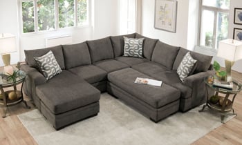 Lifestyle shot of the Croft Charcoal Sectional and Ottoman.