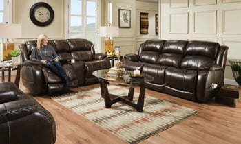 Top-grain leather console loveseat with USB charging ports on the remote.