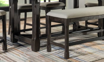 Upholstered dining counter height bench is 18 inches in depth