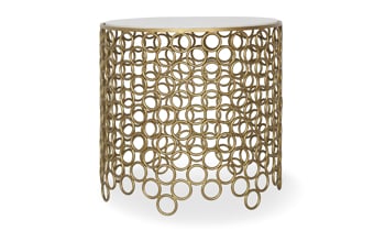 Handcrafted by skilled artisans in India this eye-catching end table is sure to make a statement in any living room.