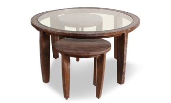 Handcrafted cocktail table made by skilled artisans in India features a subtle native tribal designs.