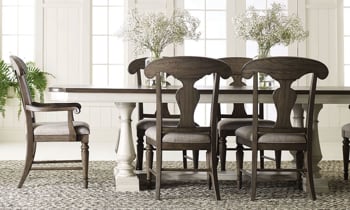 Trestle table that goes from 84" to 120" that includes 4 chairs.
