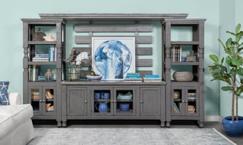 The Sage Gray Collection from Perennial Home as shown in a living room with a weathered gray lacquered finish is perfect for a traditional setting.