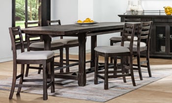 Dark brown counter height table with extension leaves from Designworks has a distressed Bark Brown wire finish.