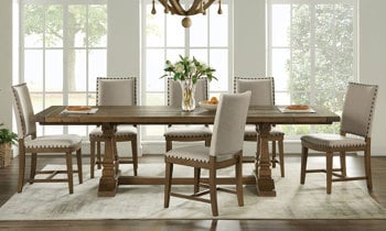 Hawthorne dining set includes an expandable dining table with six upholstered side chairs.
