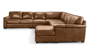 Detail shot of the Medici Chestnut Sectional layover style armrest and back cushion in dark brown top grain leather.