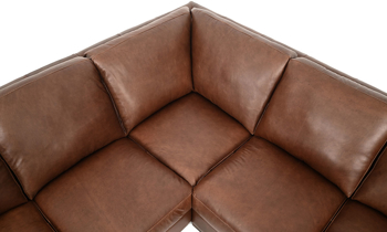Slope arms are featured on this Italian made sectional.