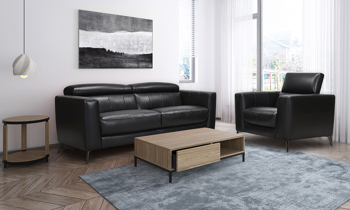 Black leather couch with adjustable headrests.
