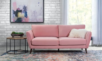 Beautiful mid-century pink velvet sofa.