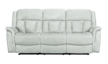 Power reclining leather 86" wide couch in a rich cream color.