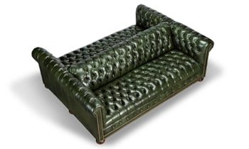 Green leather with deep button-tufted tailoring from Old Hickory Tannery.