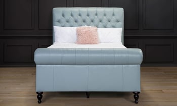 American made queen leather sleigh bed in a mist blue.