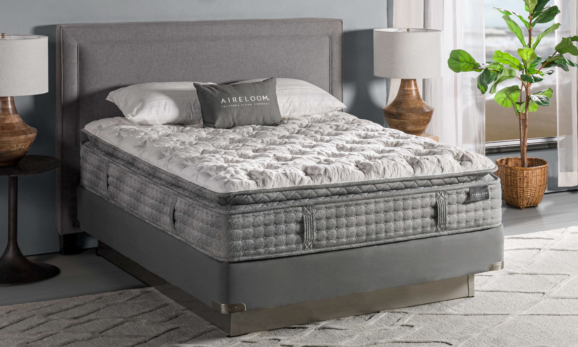 Aireloom mattress featuring tufting and a euro top.